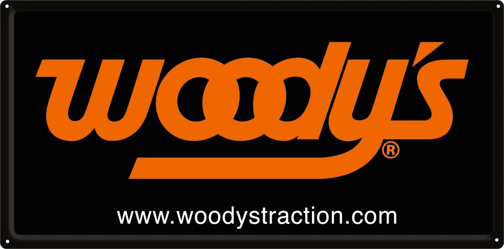Woody's Traction Metal Sign image