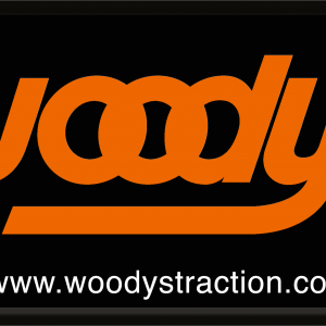 Woody's Traction Metal Sign