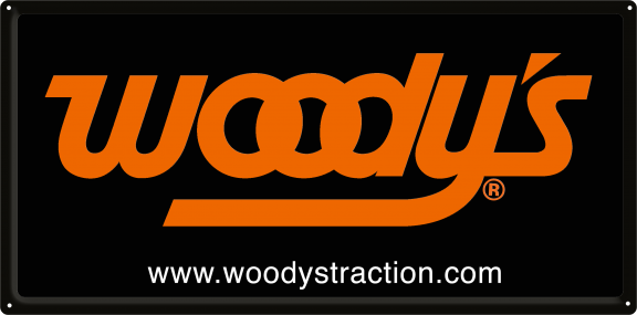 Woody's Traction Metal Sign